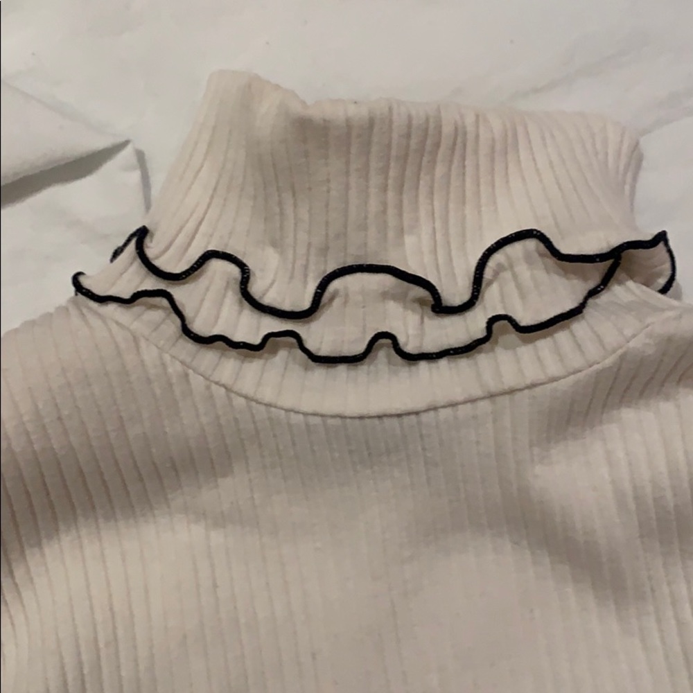 Lettuce hem ribbed cream turtleneck